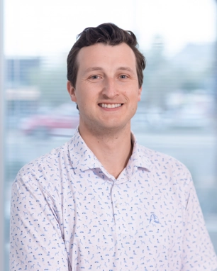 portrait of a smiling person in professional attire